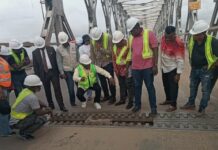 Umahi inspects vandalised old Niger Bridge, orders immediate repairs, CCTV